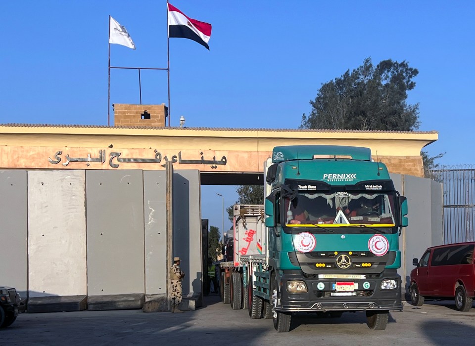 A truck taking humanitarian aid to Gaza crosses the Rafah border crossing between the Gaza Strip and Egypt