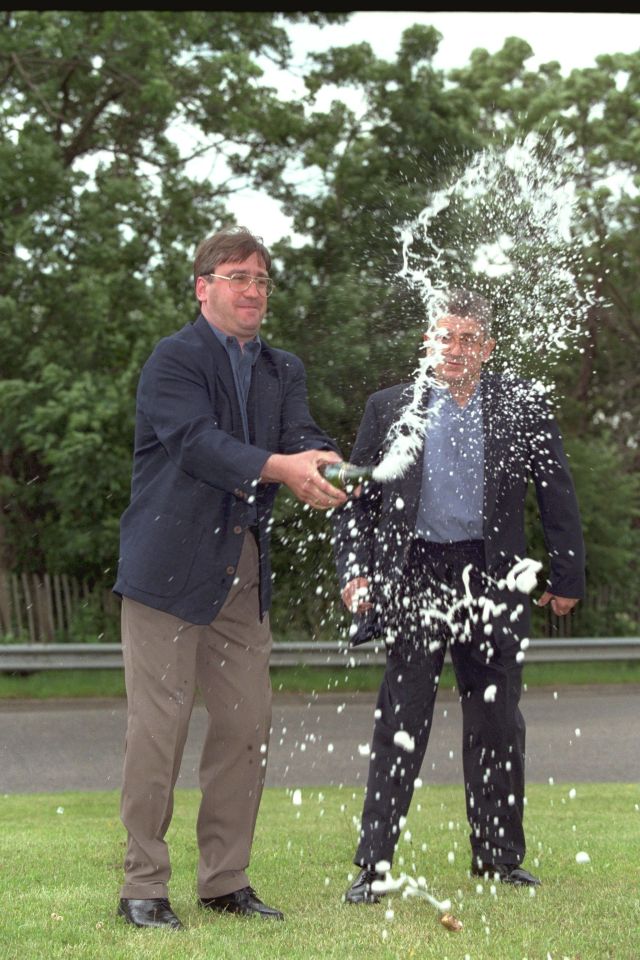 Mark Gardiner popping the champagne as he celebrated the win