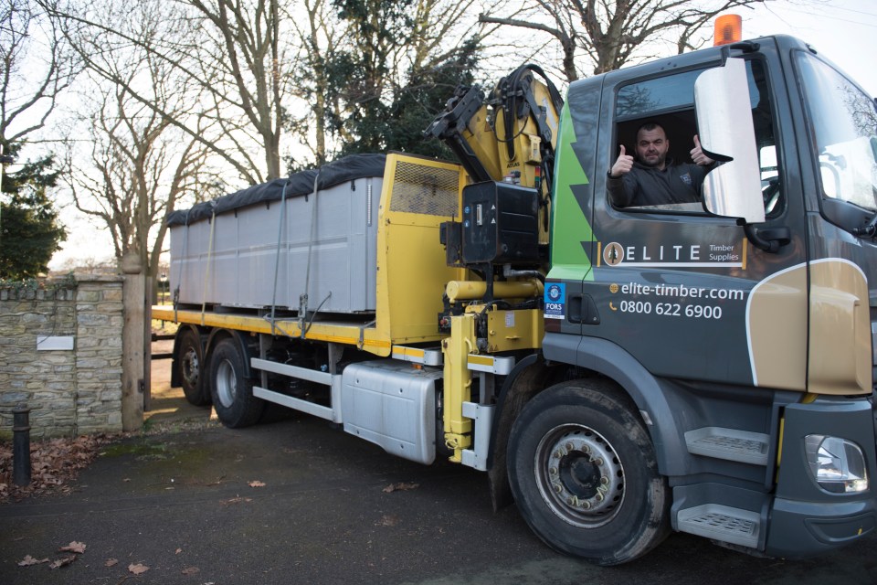 The hot tub was driven away on a lorry after the wing began to be demolished