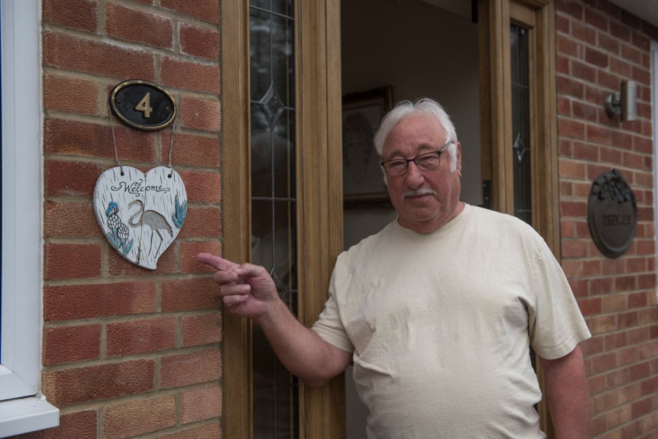 Trevor Lugmayer pointing to where a Blue Plaque use to hang saying ‘Lewis Hamilton Racing Driver lived here 1997-2001′