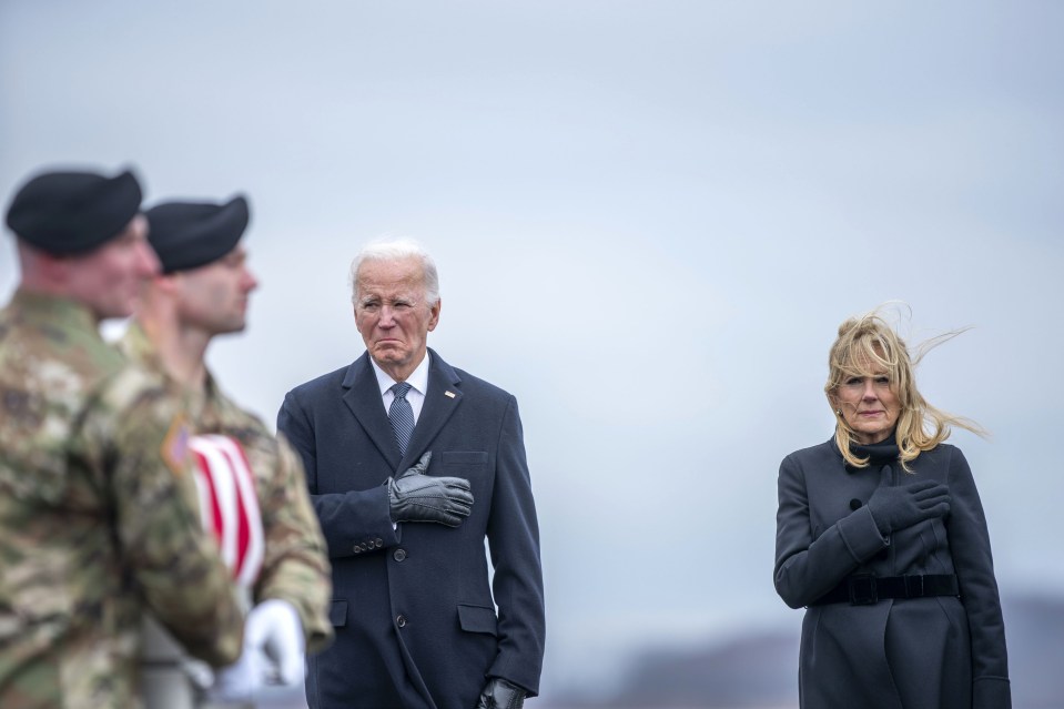 Joe and Jill Biden watched on as the bodies of the three US troops killed in Jordan were carried by American soldiers