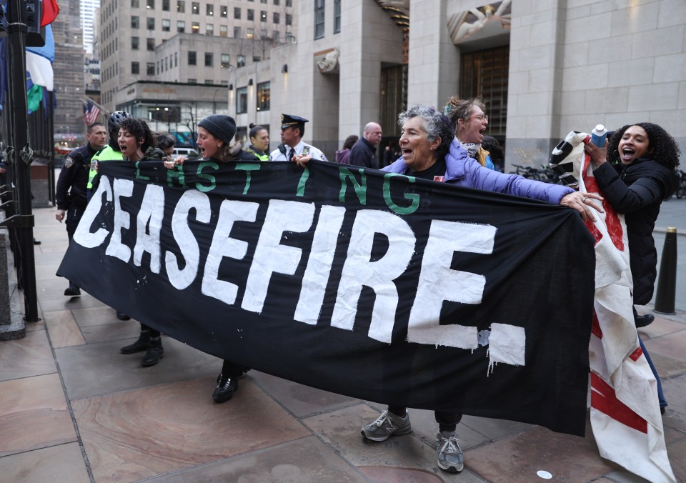 Pro-Palestinian protesters gather in front of the NBC Centre ahead of Biden’s appearance on Late Night With Seth Meyers