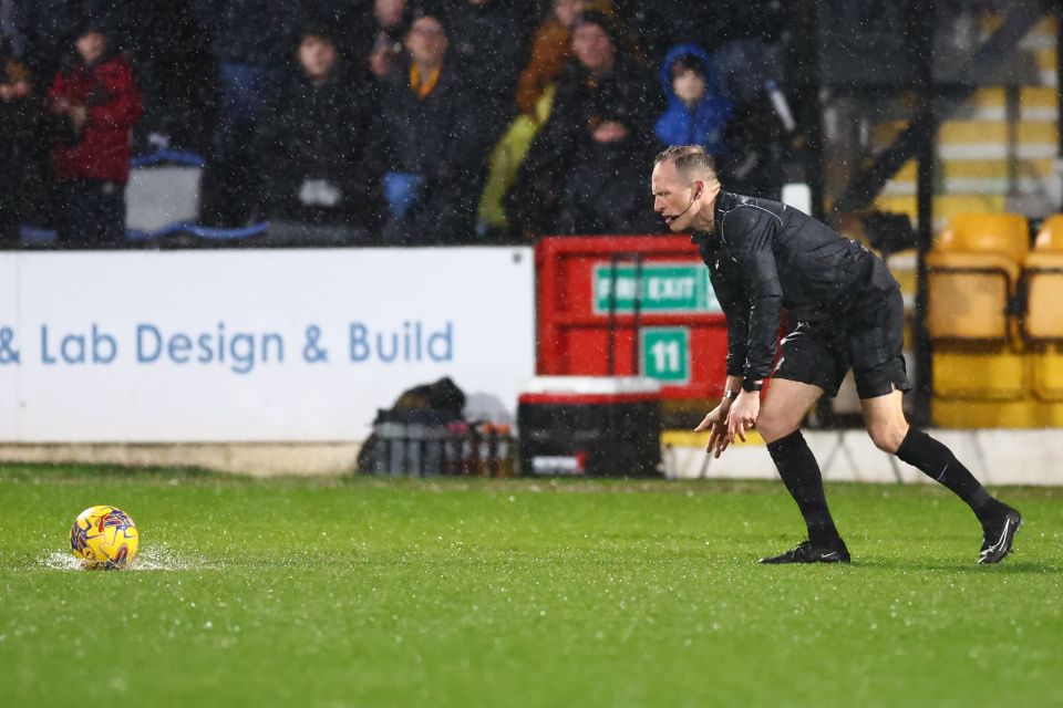 Heavy downpours made the pitch unplayable despite work from ground staff