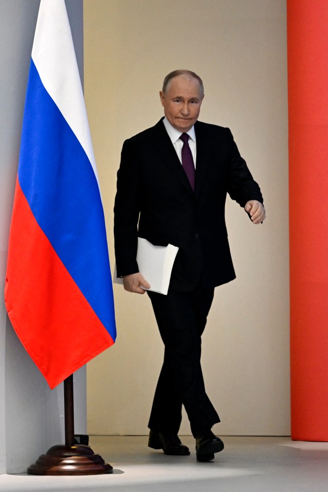 Putin arriving at the Gostiny Dvor conference centre in central Moscow