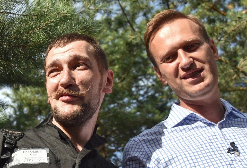 The late Russian opposition leader Alexei Navalny, right, and his younger brother Oleg, left, in 2018