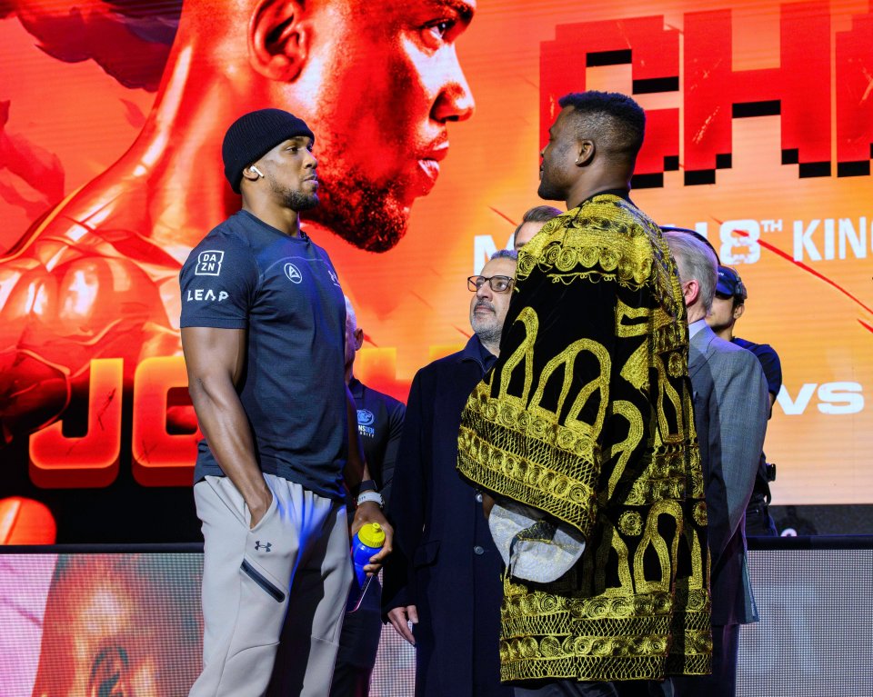 Anthony Joshua facing off with Francis Ngannou