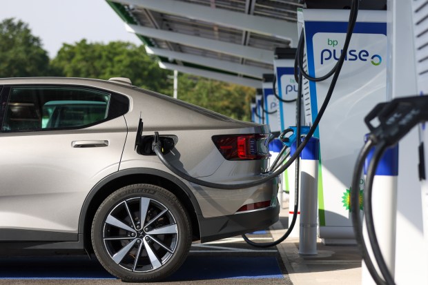 a car is being charged at a bp pulse station