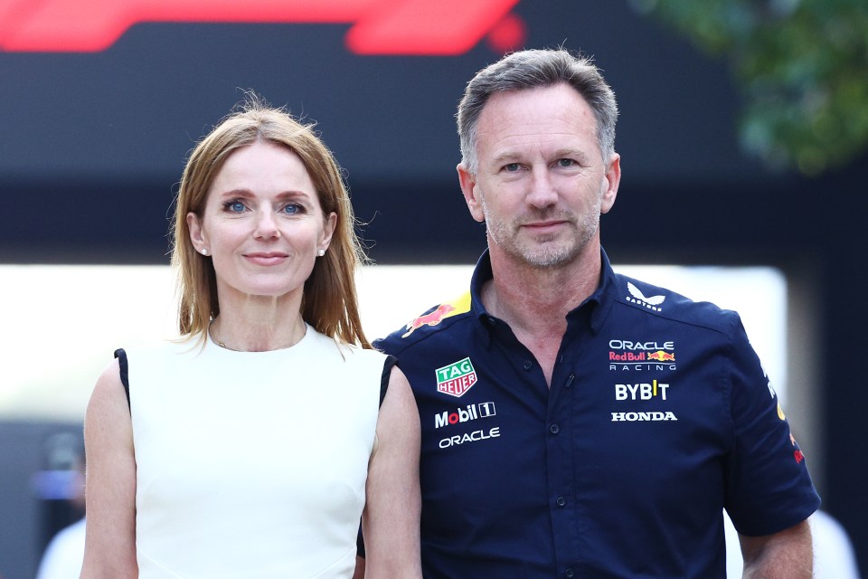 BAHRAIN, BAHRAIN - MARCH 02: Oracle Red Bull Racing Team Principal Christian Horner and Geri Horner walk in the Paddock holding hands prior to the F1 Grand Prix of Bahrain at Bahrain International Circuit on March 02, 2024 in Bahrain, Bahrain. (Photo by Clive Rose/Getty Images)