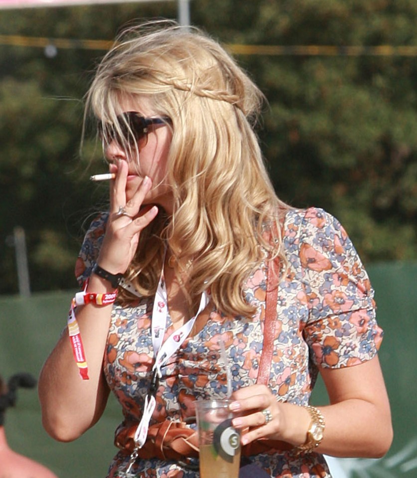 Holly enjoyed a fag while at V Festival back in 2009