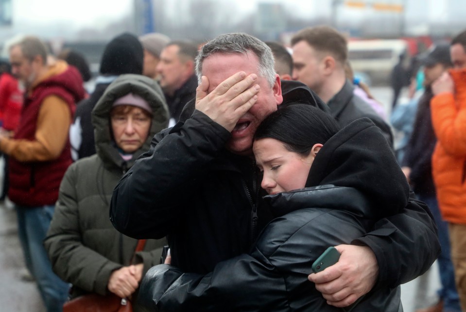 Reactions of mourners outside the scene of the attack