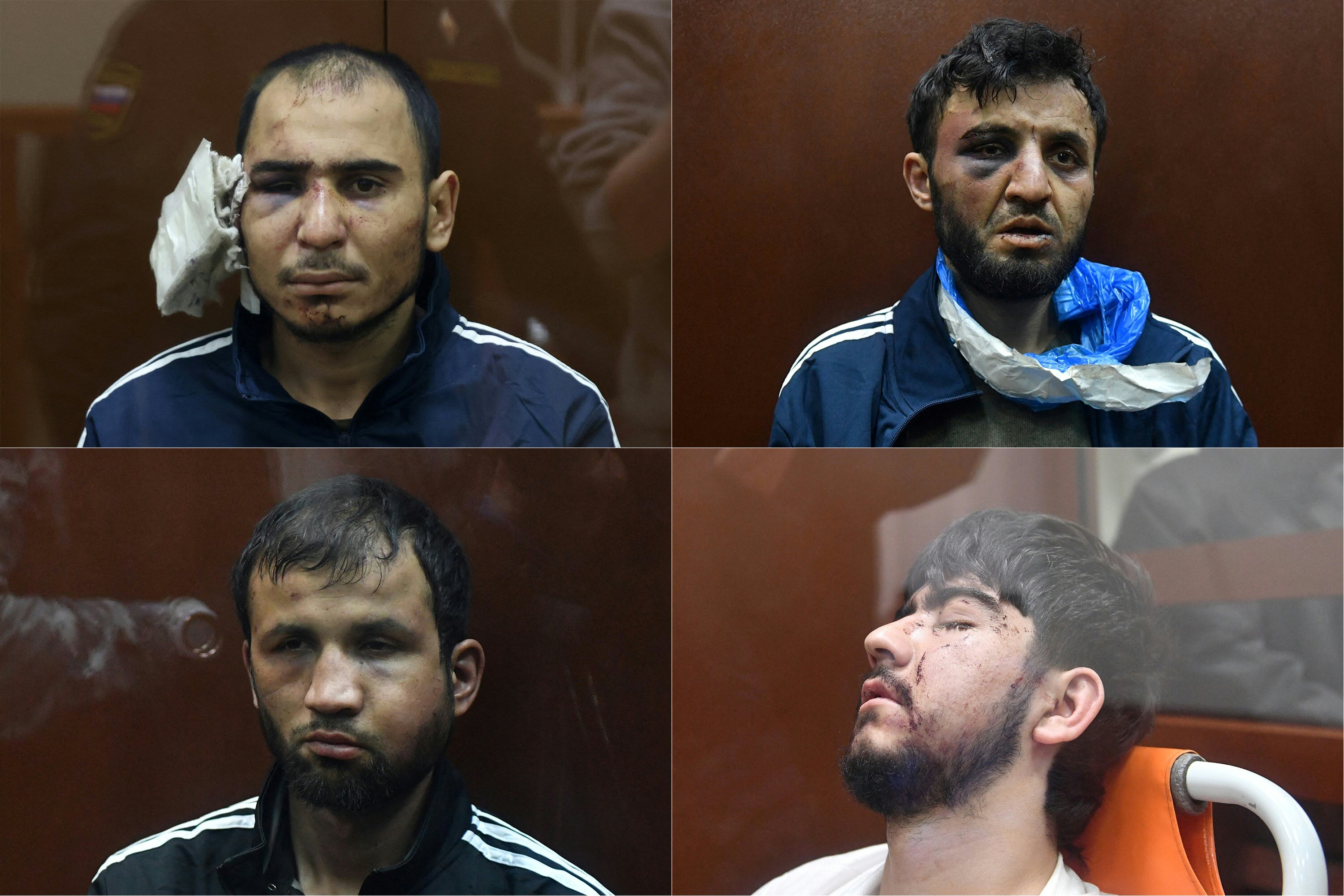 The four terror suspects appeared bloody and beaten in court (Clockwise from top L) Saidakrami Murodalii Rachabalizoda, Dalerdjon Barotovich Mirzoyev, Muhammadsobir Fayzov and Shamsidin Fariduni