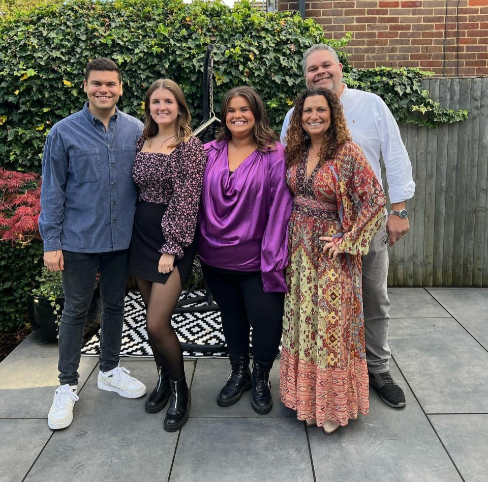 Amy pictured here with her parents, brother Josh and Hannah