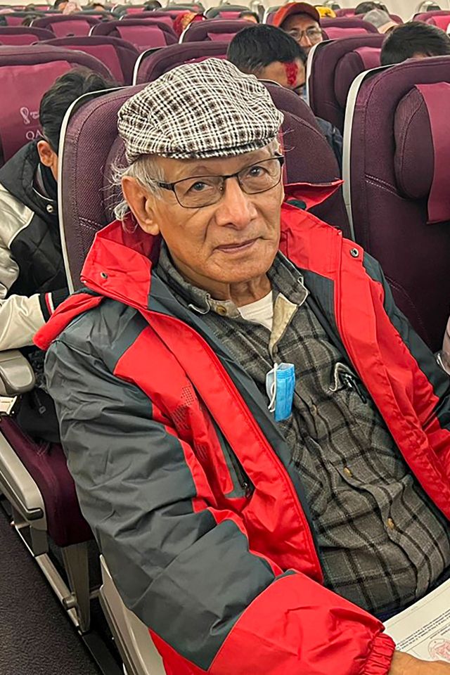 French serial killer Charles Sobhraj sits in an aircraft departing from Kathmandu to France, on December 23, 2022