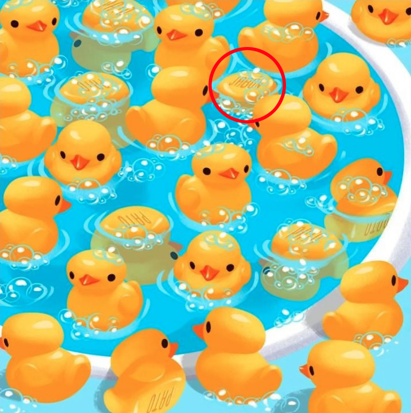 The soap was in between the rubber ducks