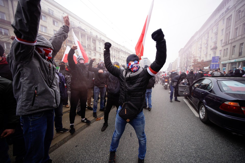 Some hardcore football fans attended the Independence Day march in Warsaw, where some participants calshed with riot police