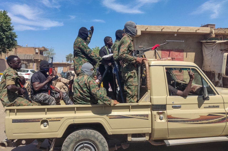 Supporters of the Sudanese armed popular resistance, which supports the army, ride on trucks in Gedaref on March 3, 2024