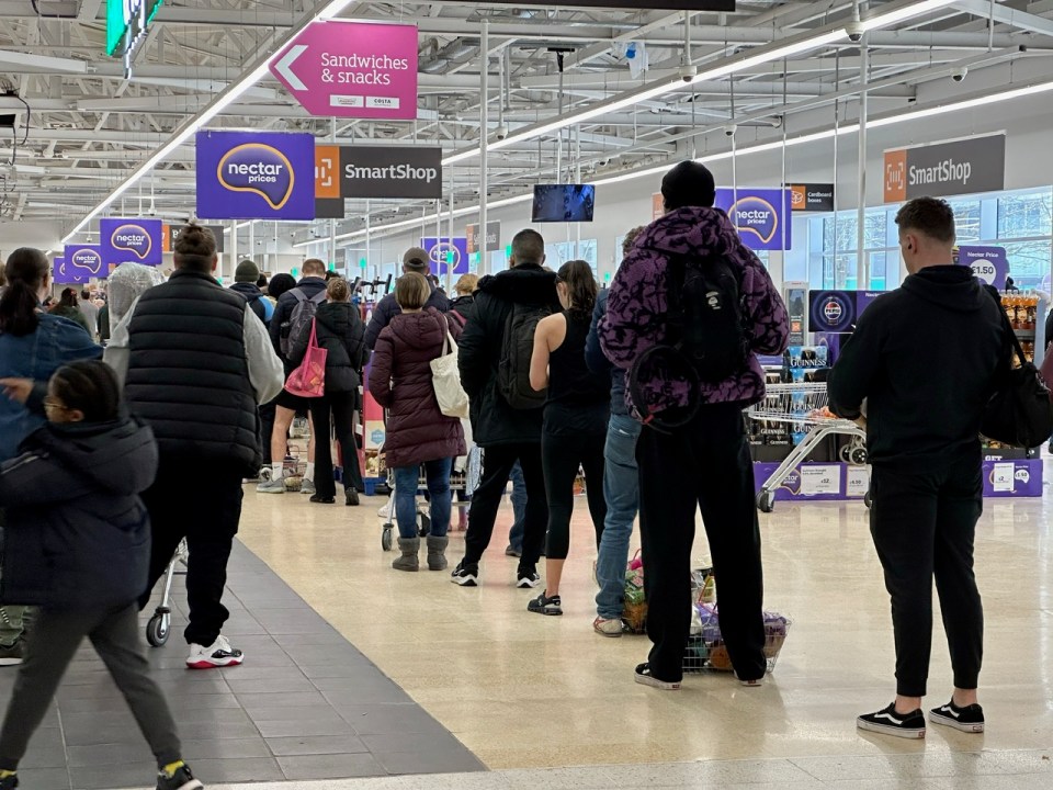 Lines formed at stores as shoppers could only pay with cash