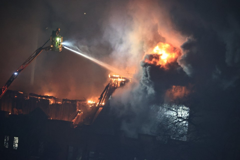 Fire crews were working to extinguish flames at a police station in Forest Gate