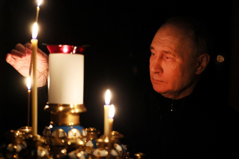 Putin made his first 'public appearance' from the terror attack when he lit a candle in a church outside Moscow