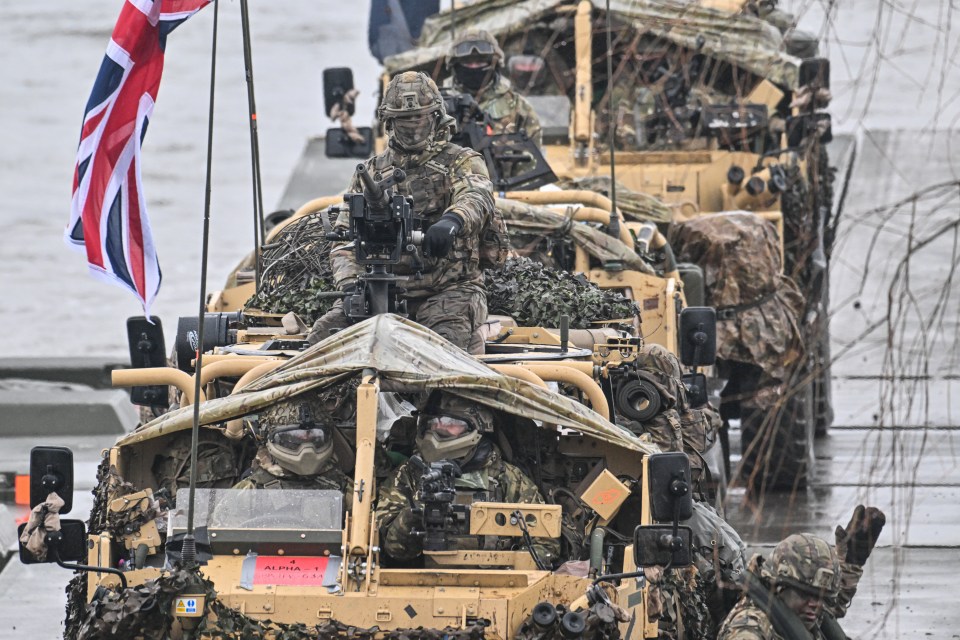 British soldiers inside armoured vehicles during the DRAGON-24 Nato military defence drills in Poland