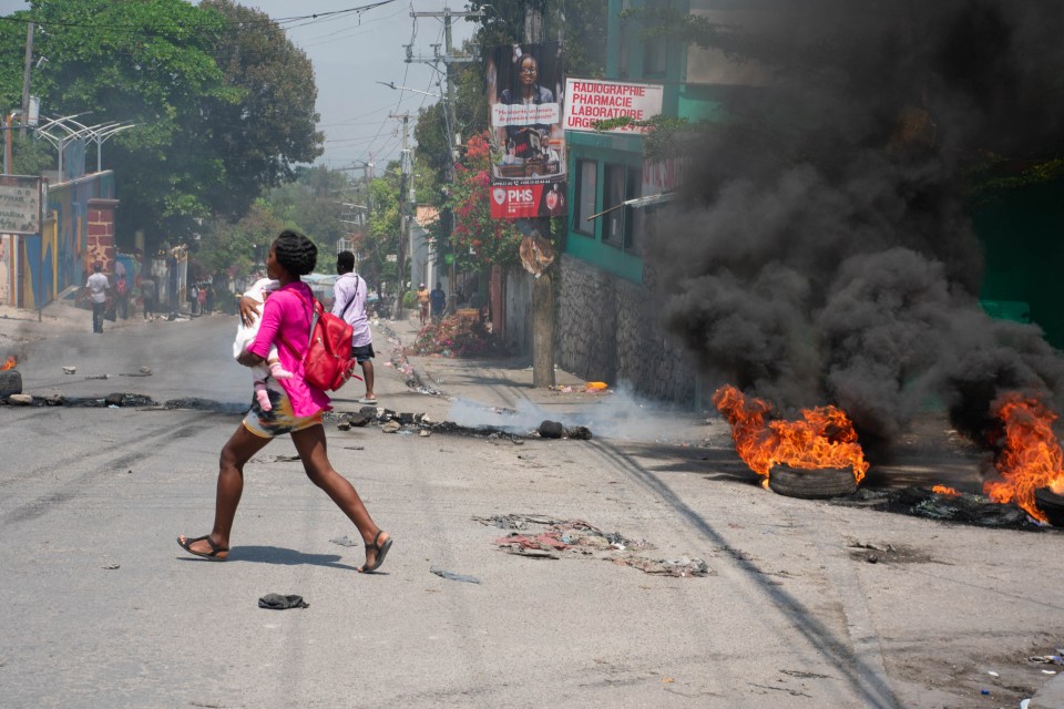 Several 'gangsters' were killed, dismembered, dragged through the streets and set on fire by citizens in Petion-Ville on Wednesday