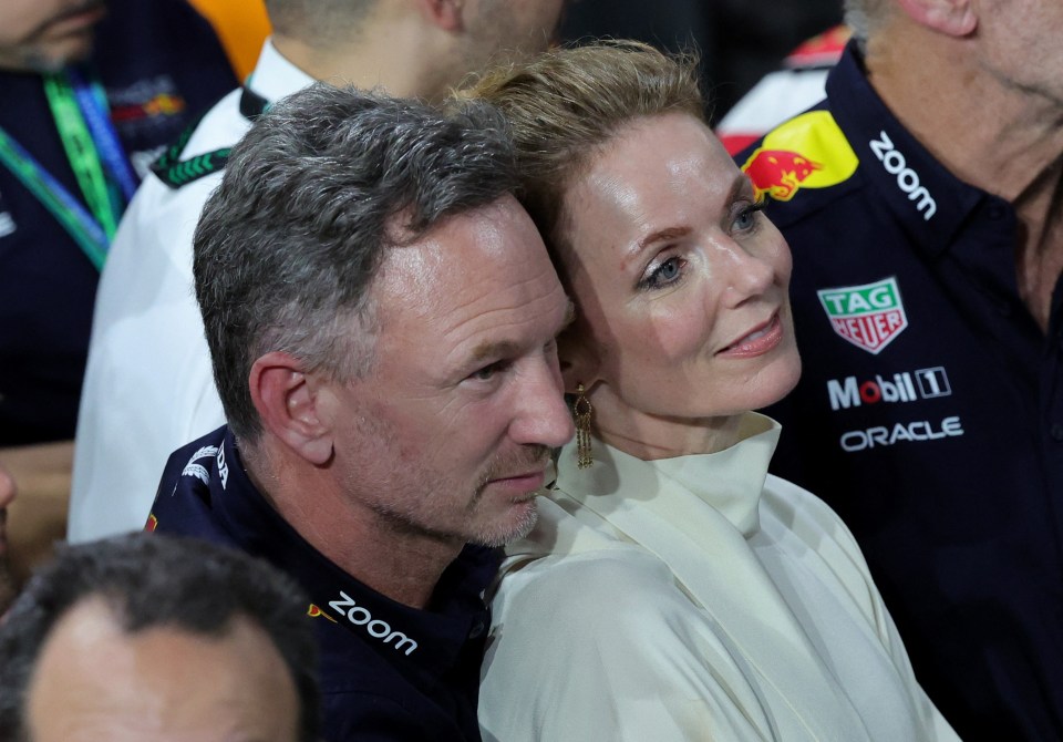 Red Bull team principal Christian Horner and his wife Geri Halliwell cuddle up at the Saudi Arabian Grand Prix in Jeddah yesterday