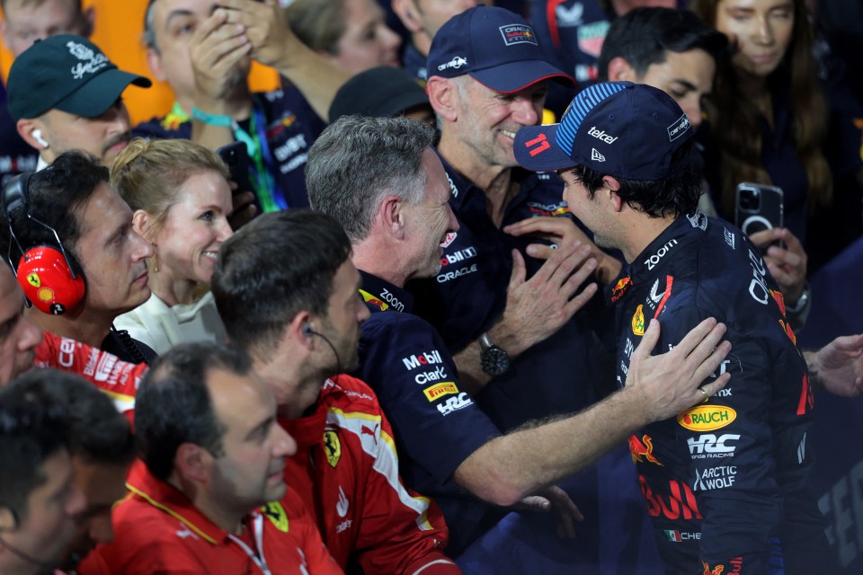 Red Bull’s Sergio Perez celebrates with Horner after finishing second at the Saudi Arabian Grand Prix Pool