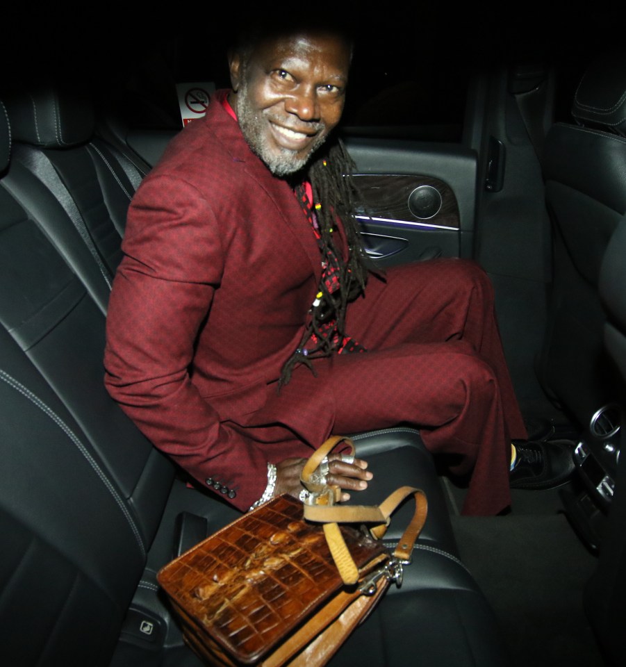 Levi Roots looked dapper in a bergundy suit