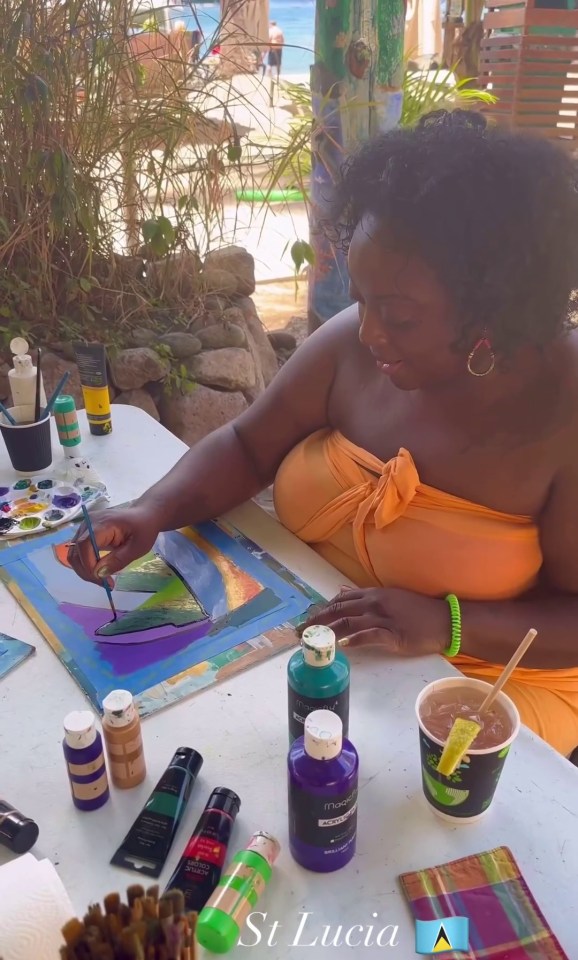 The TV personality enjoyed creating art on the beach