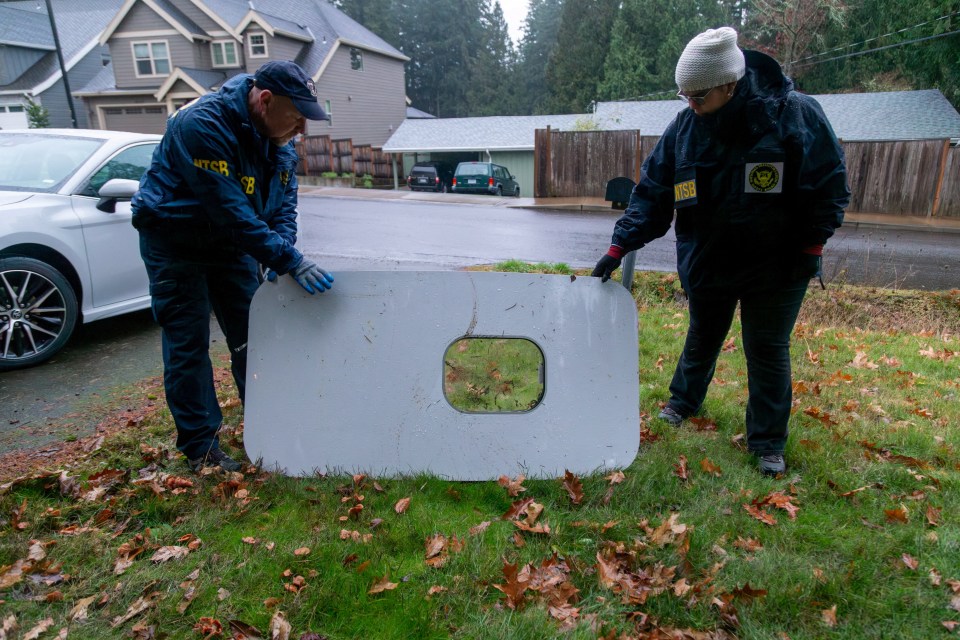 The fuselage plug area being examined after it was jettisoned out in mid-air