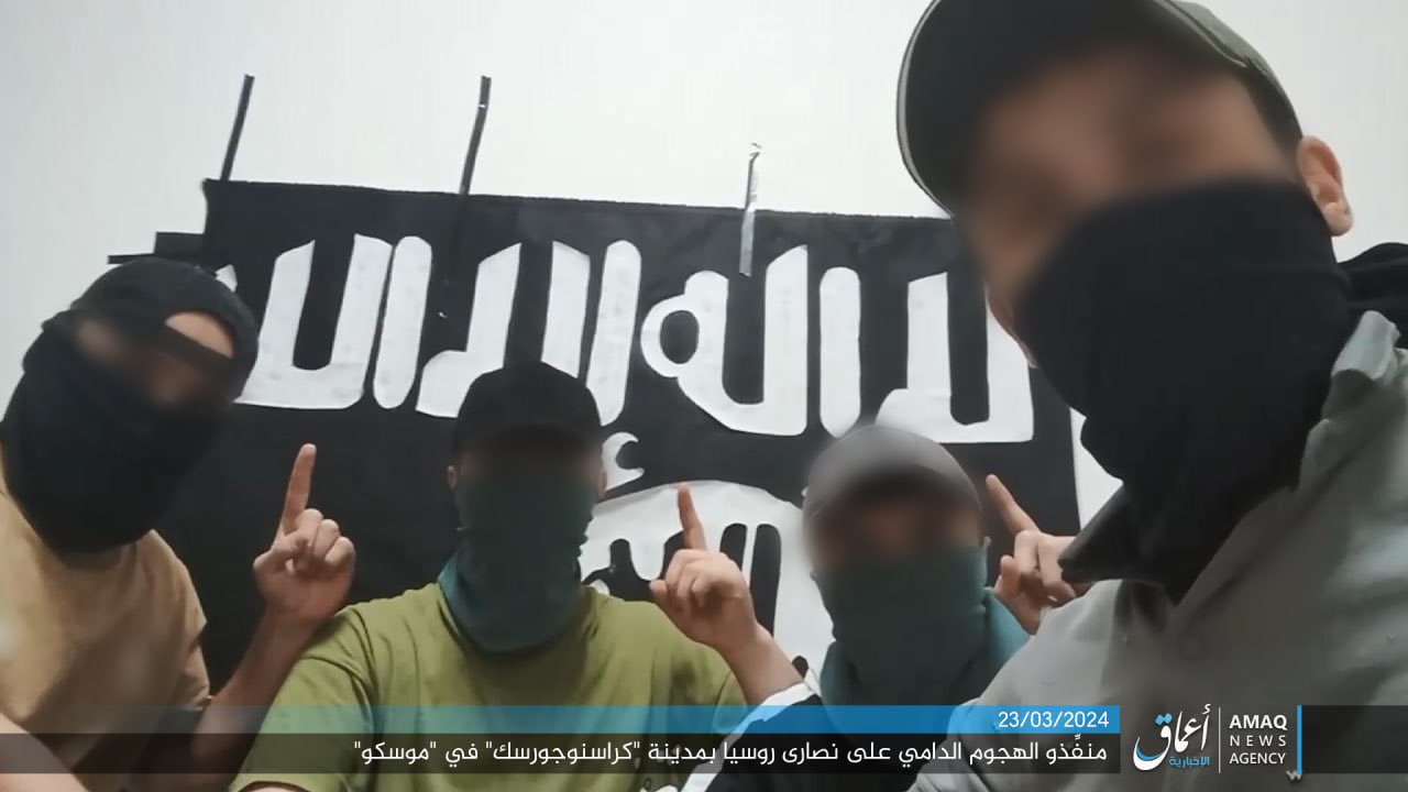 ISIS released an alleged picture of the four gunmen posing by their black death cult flag before the attack