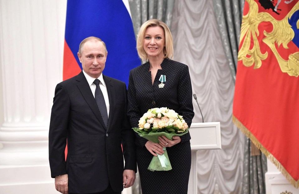 Vladimir Putin’s stooge Maria Zakharova, pictured together in 2017, has been peddling wild rumours