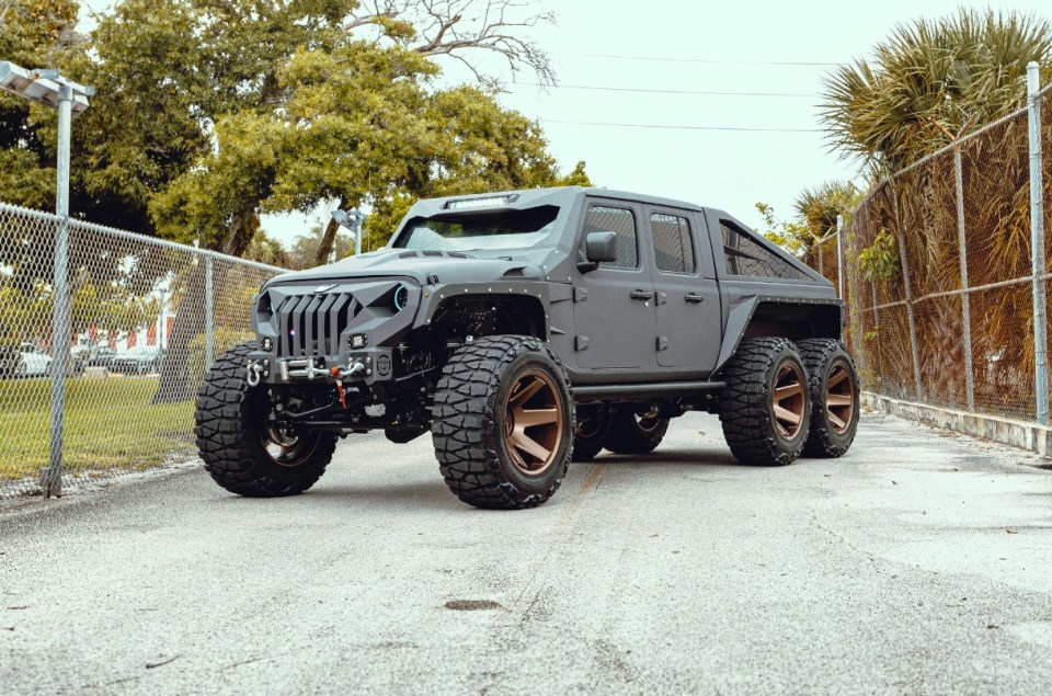 It has been modified from the Jeep Gladiator and given an extra axle for a 6x6 drive