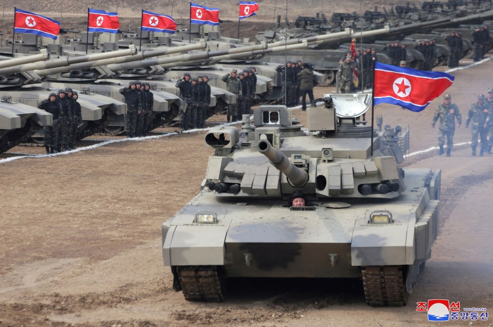 North Korean leader Kim Jong Un appears to sit inside an armoured vehicle as he joins his troops during drills amid joint US/South Korean military exercises