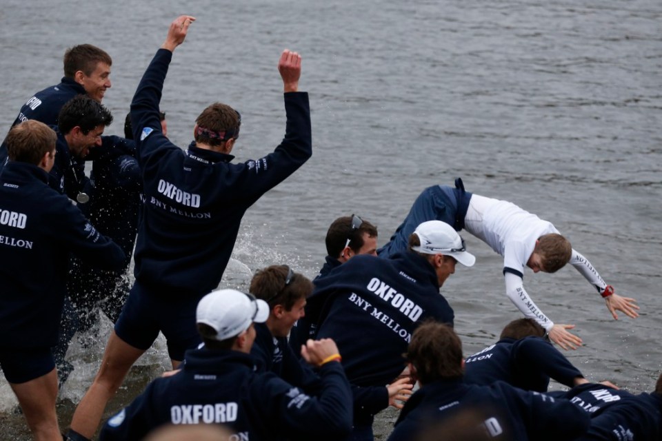 It's a longstanding Boat Race tradition that the winning cox is thrown into the Thames by their teammates