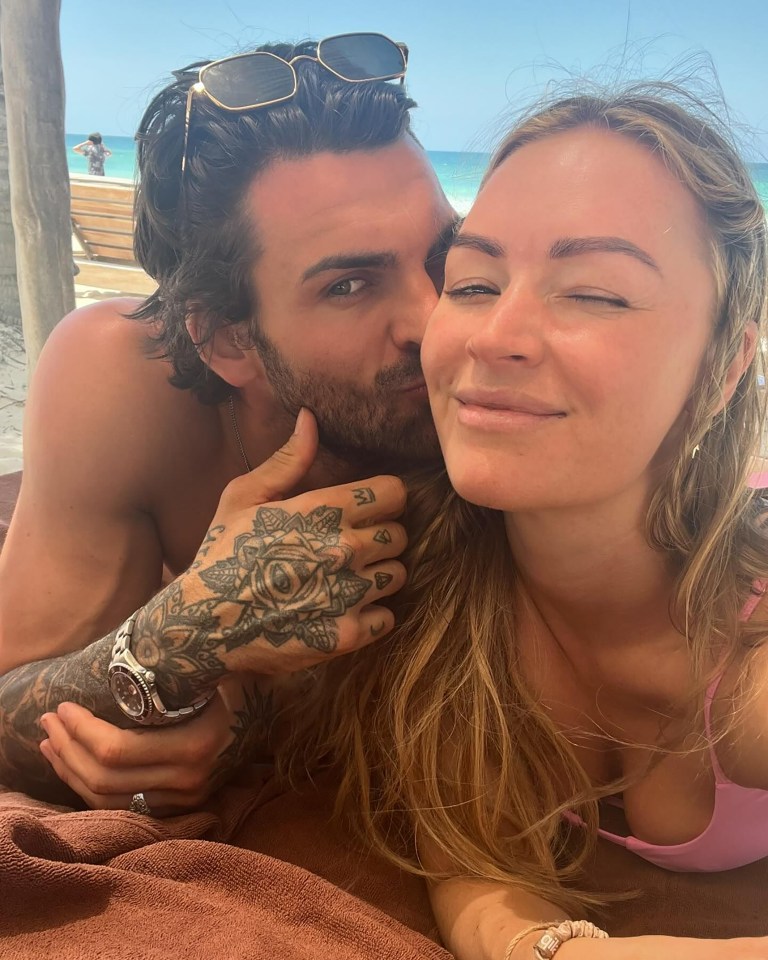 Laura and Adam have been relaxing on the beach together