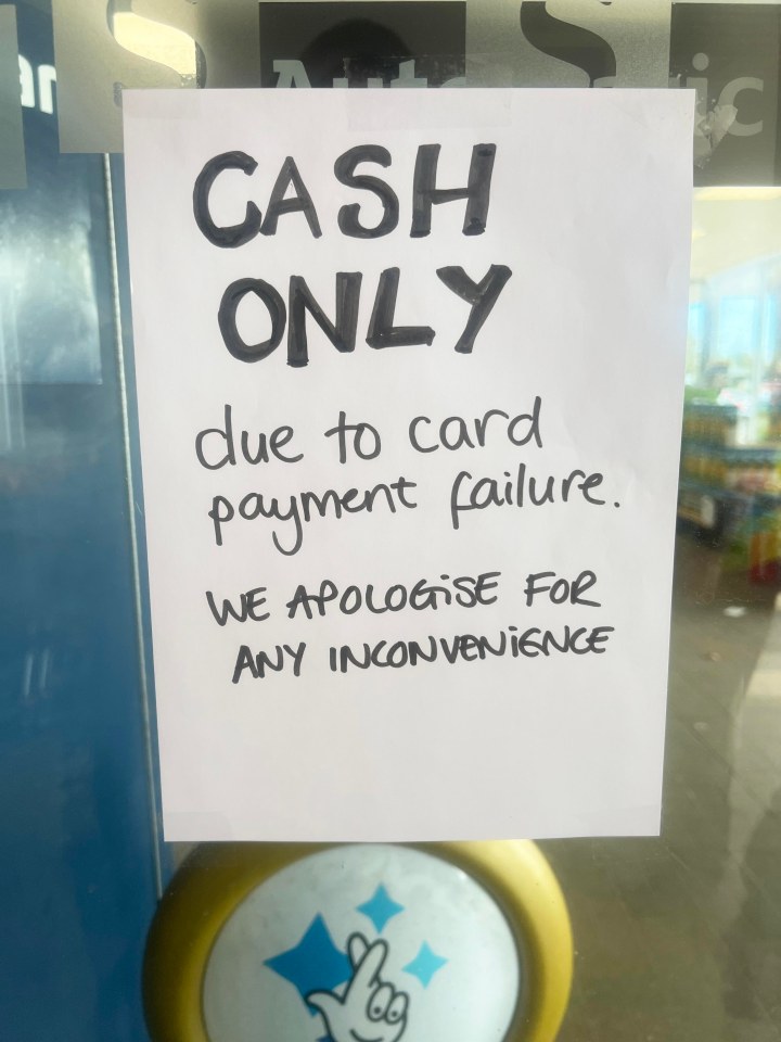 Staff in Worthing put up makeshift signs telling customers of the tech failures