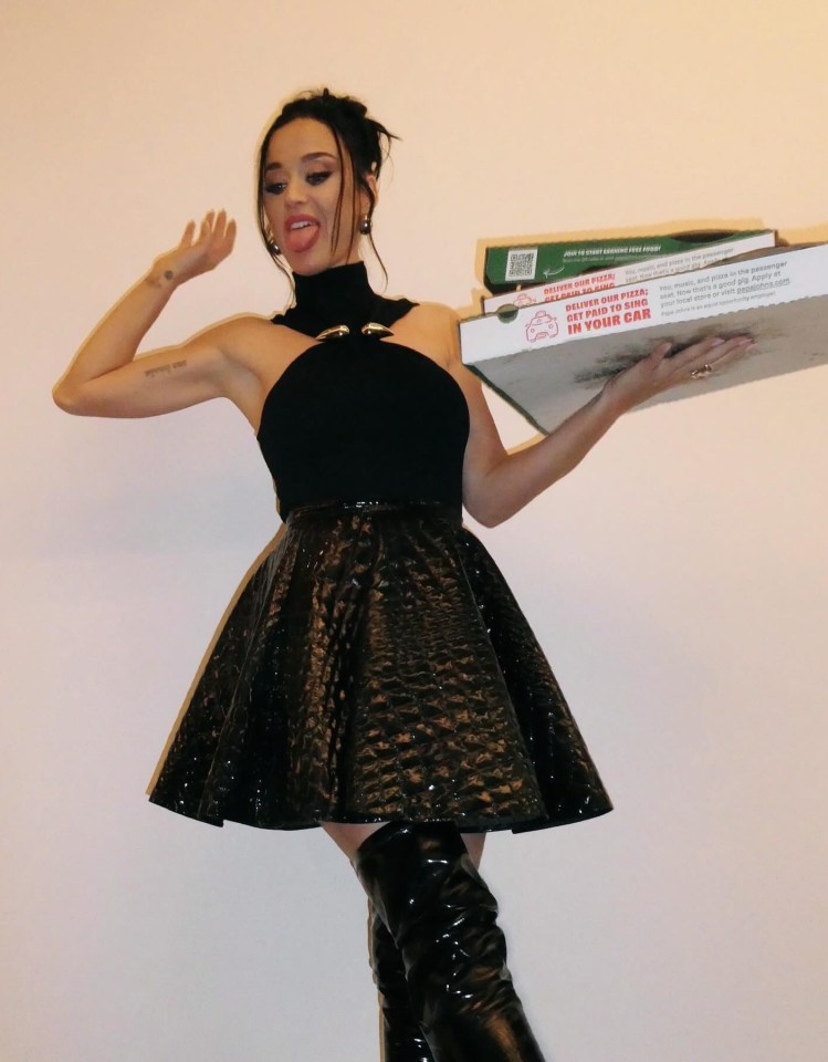 Katy Perry picked up a stack of Papa Johns pizzas after watching Madonna’s show in Los Angeles