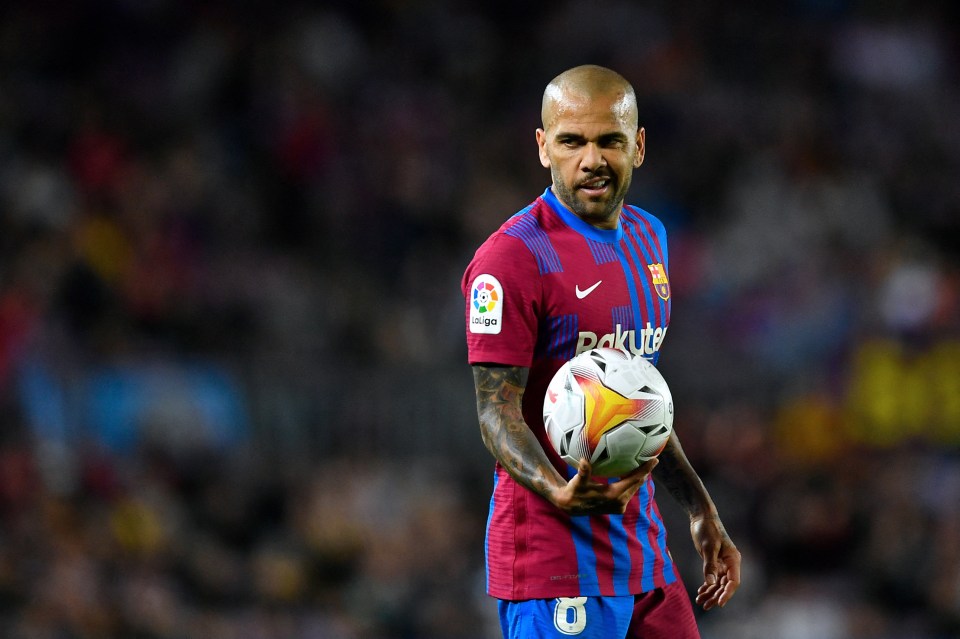 Ex-Barcelona Brazilian defender Dani Alves holds the ball during the Spanish League football match between FC Barcelona and RCD Mallorca in May 2022