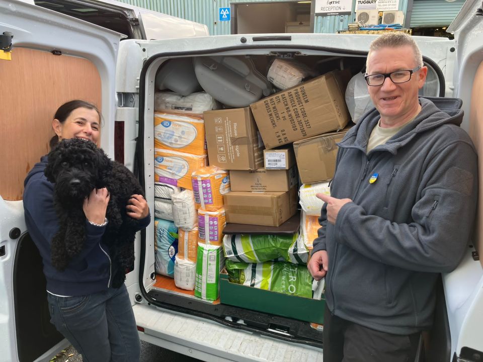 Will and Paula Massey load charity supplies for their mission of mercy