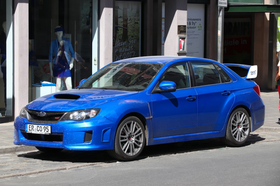 A blue Subaru Impreza WRX STI could be yours for less than £10,000