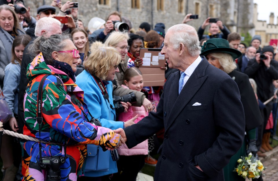 The King greeted well-wishers ahead of the service in Windsor on Sunday