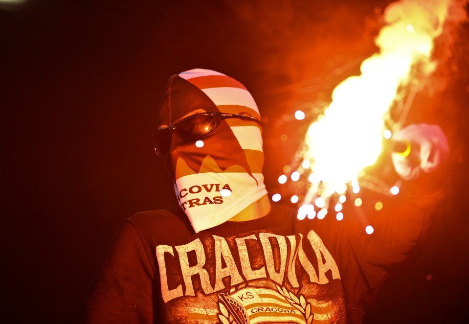 A Cracovia supporter during the derby match between Wisla Krakow and Cracovia Krakow