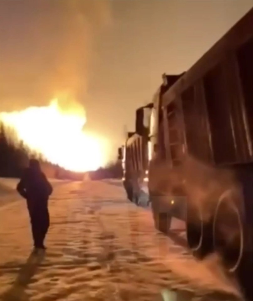 Bystanders watch on as the fireball erupted into the sky