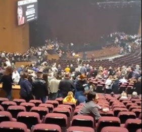 Concertgoers scrambled to get away from the gunmen who opened fire in the packed hall