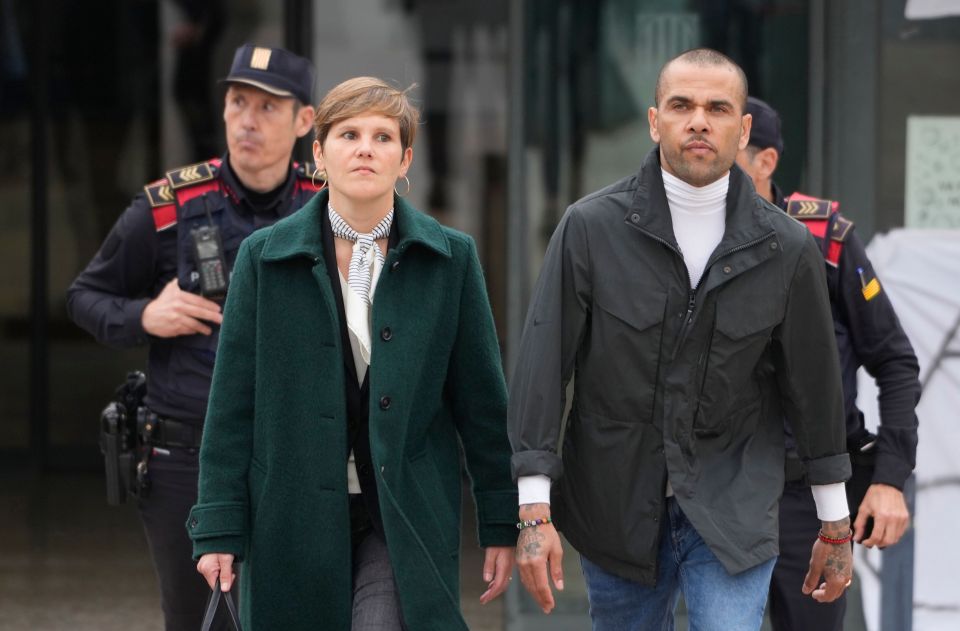 Dani Alves alongside his lawyer Ines Guardiola leaving prison today