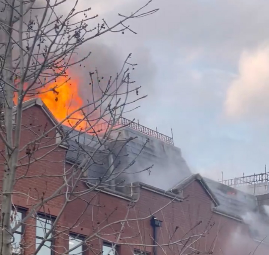 Part of the police station, including its roof, was on fire