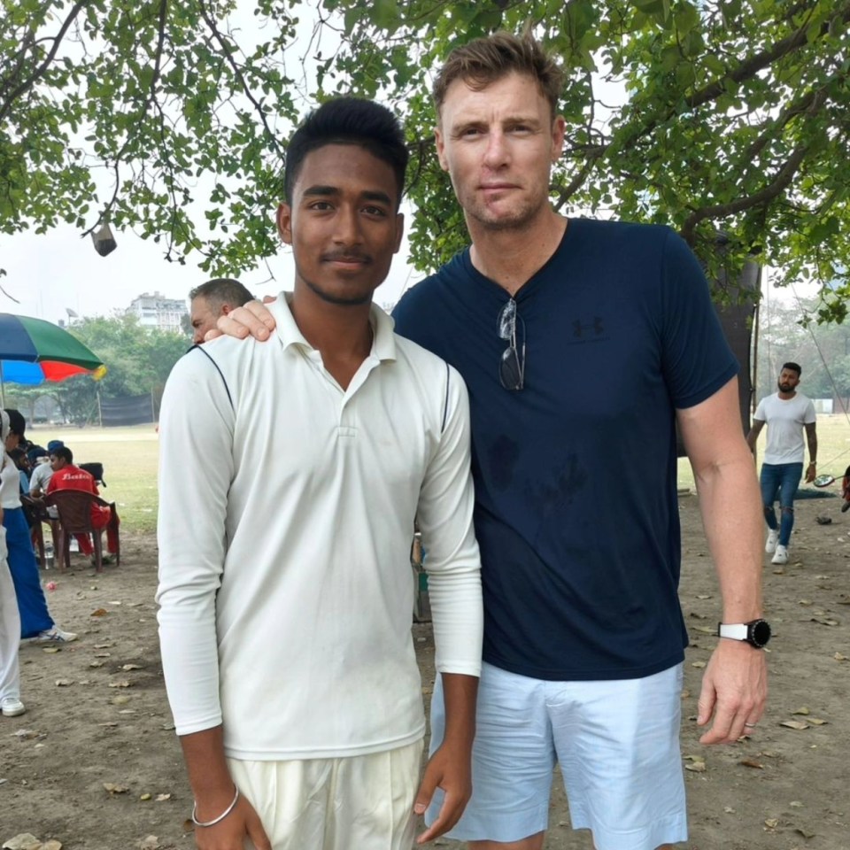 Freddie Flintoff posed with a young cricketer in India showing his healed scars while filming the second season of his BBC show