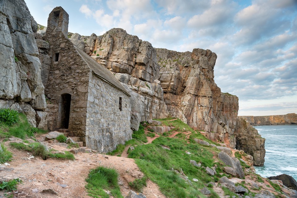 St Govan’s chapel in Pembrokeshire overlooks the beach