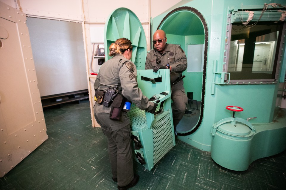 Staff members dismantle the death row gas chamber at San Quentin State Prison on March 13, 2019